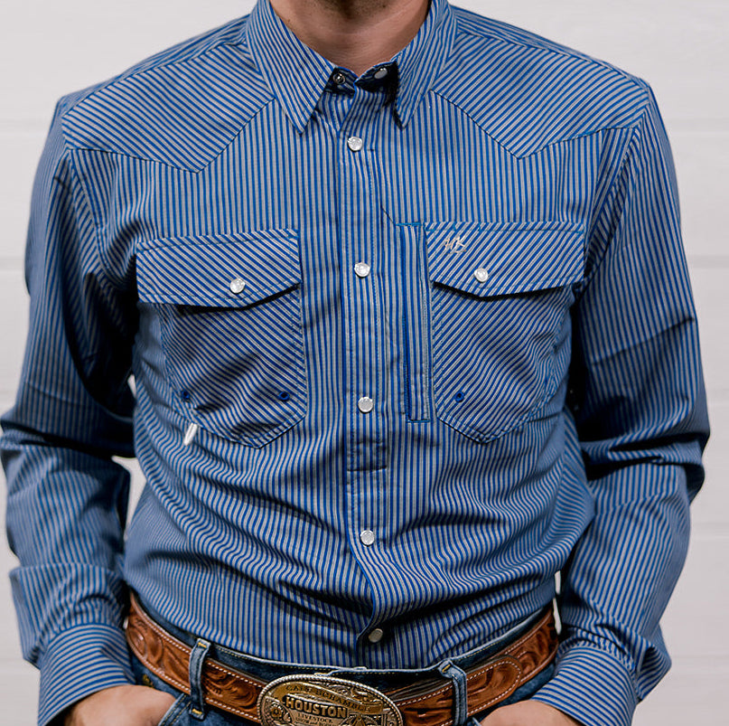 Man wearing a blue striped shirt with a belt and buckle against a plain background. front facing.