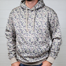 Person wearing a camouflage-patterned hoodie against a plain background showing the front