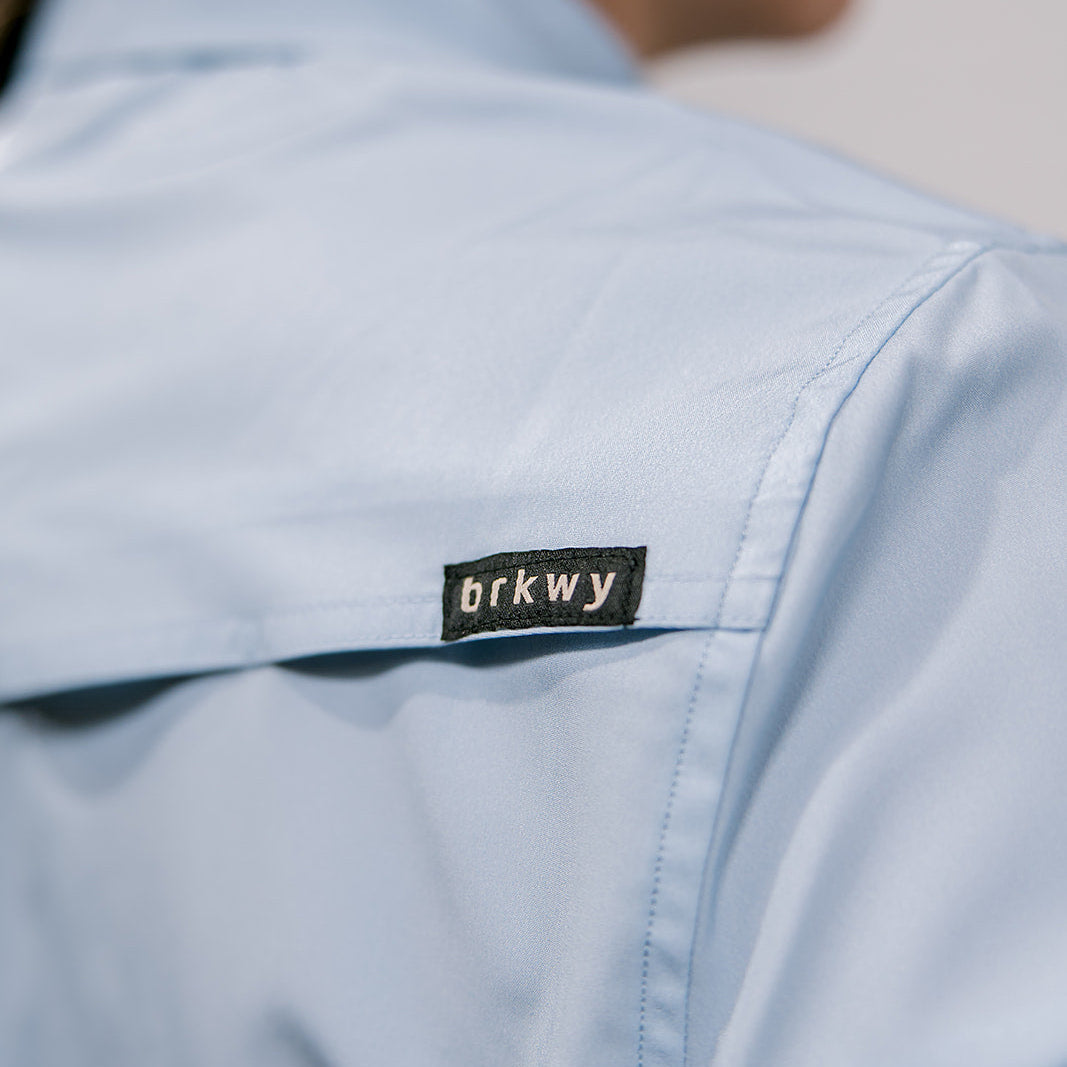 Light blue shirt with a 'brkwy' logo on the back vent 