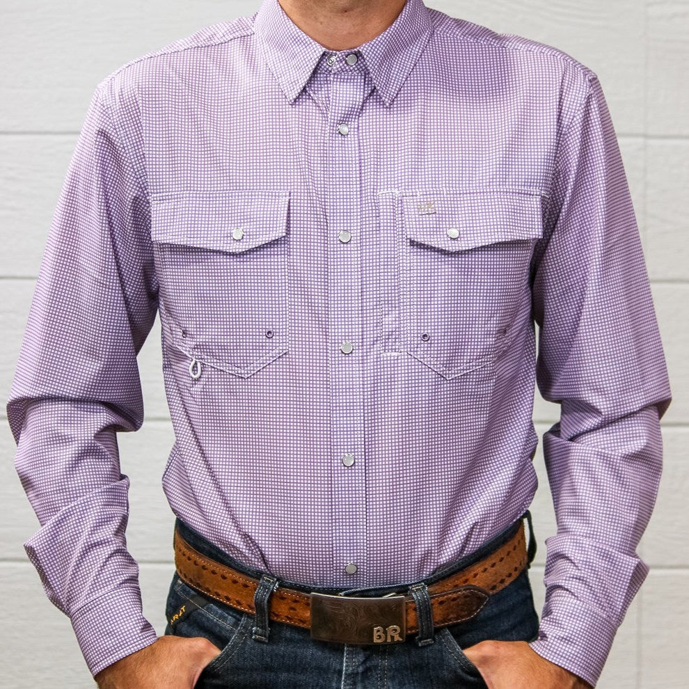 A man wearing a light purple and white micro-check long-sleeve western shirt with two chest pockets, paired with a brown leather belt and dark blue jeans.