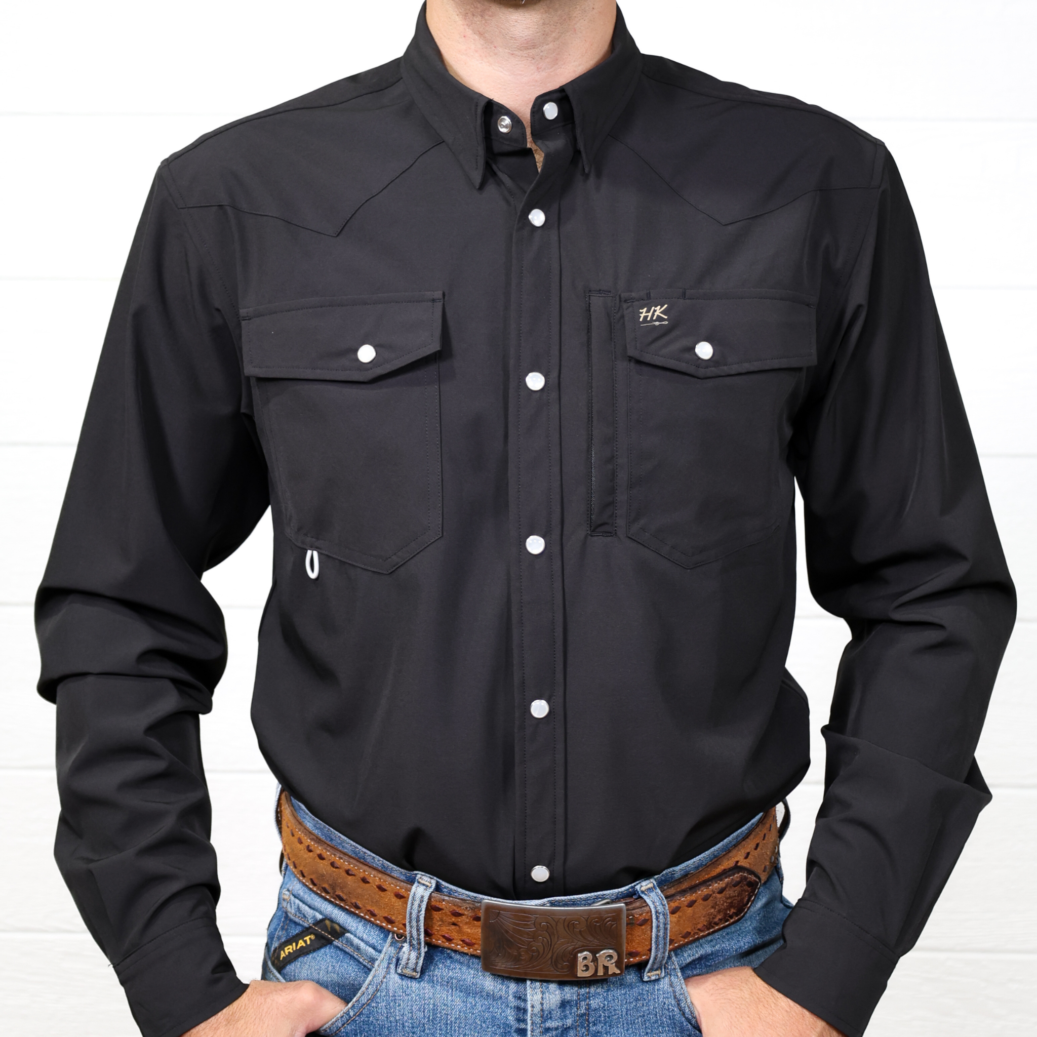 Front of Black shirt with visible brand logo on a white background